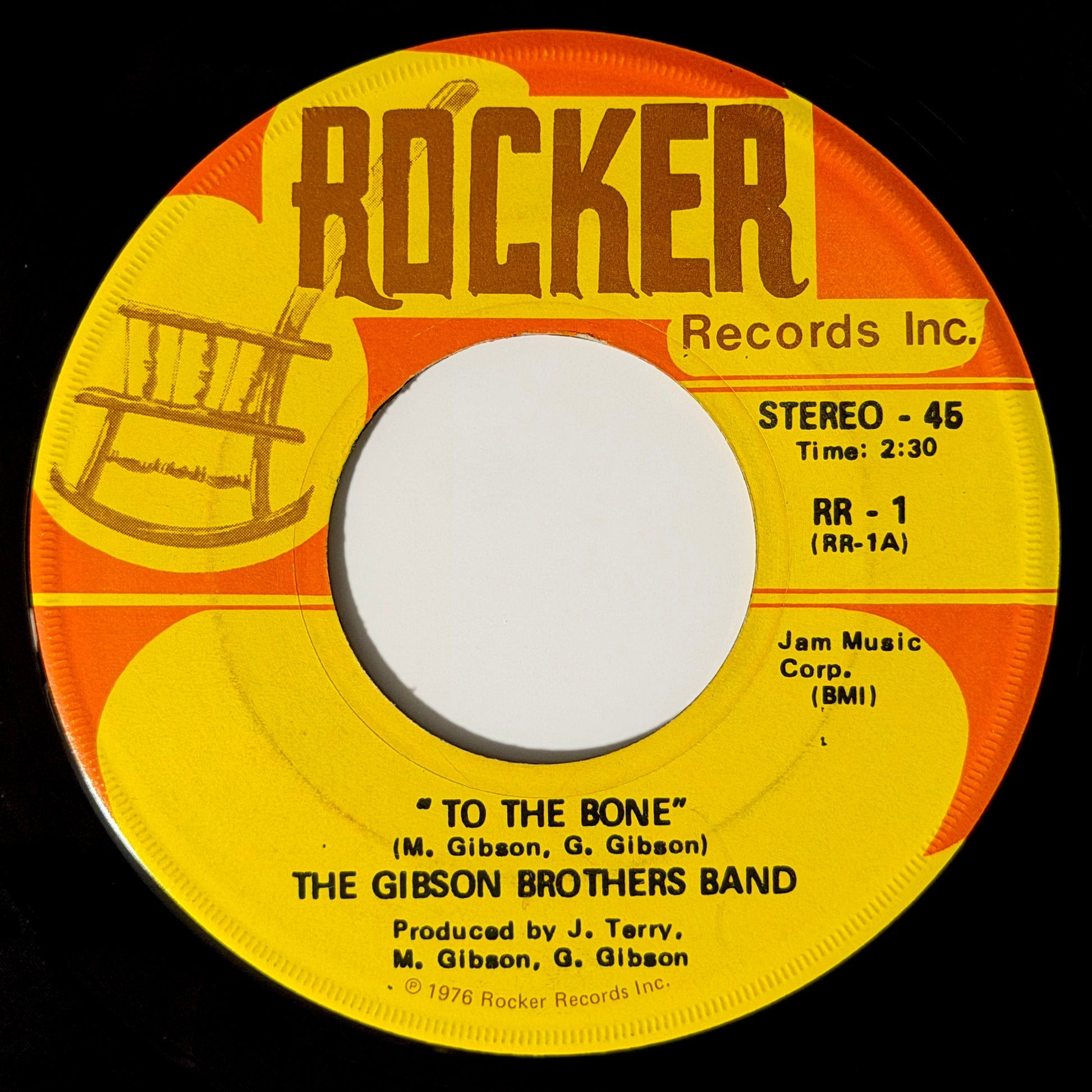 Gibson Brothers Band - To The Bone / Love Coming At Us [1976 US Original Press - Rocker Records Inc. RR-1] (7inch)_1