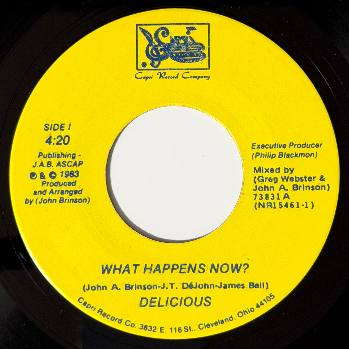 Delicious - What Happens Now? / (We're Getting Into) Trouble [1984 US Original Press - Capri 73831] (7inch)_1