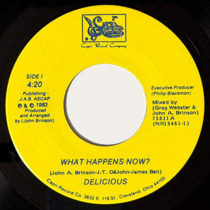 Delicious - What Happens Now? / (We're Getting Into) Trouble [1984 US Original Press - Capri 73831] (7inch)_1
